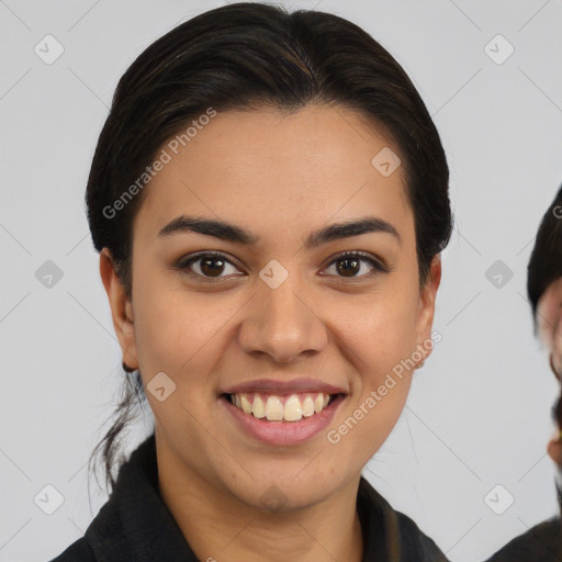 Joyful latino young-adult female with medium  brown hair and brown eyes