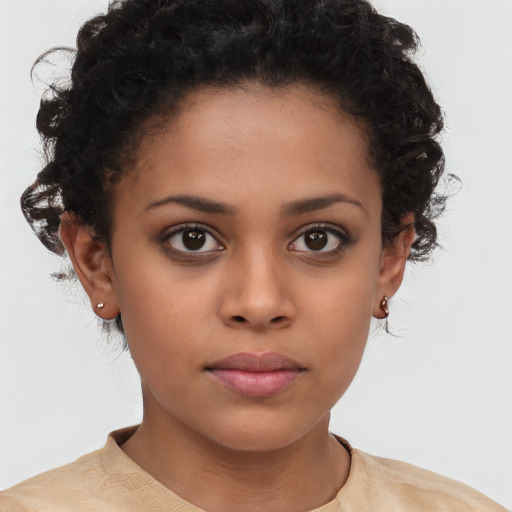 Neutral latino young-adult female with short  brown hair and brown eyes
