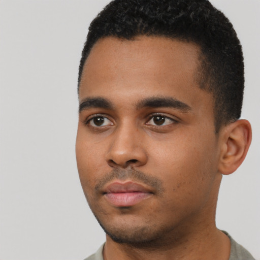 Neutral black young-adult male with short  black hair and brown eyes