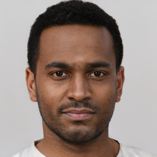 Neutral black young-adult male with short  black hair and brown eyes
