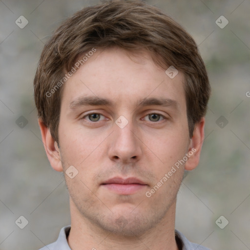 Neutral white young-adult male with short  brown hair and grey eyes