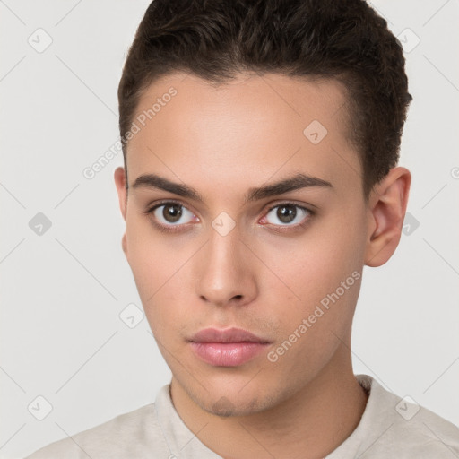 Neutral white young-adult male with short  brown hair and brown eyes