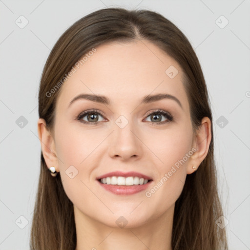 Joyful white young-adult female with long  brown hair and grey eyes