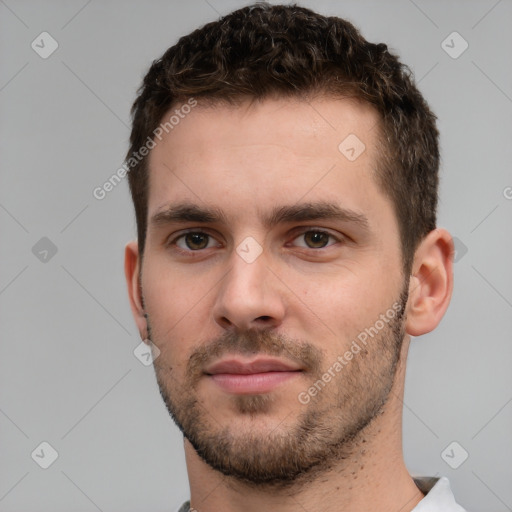 Neutral white young-adult male with short  brown hair and brown eyes