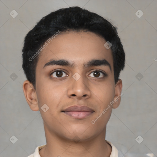 Joyful latino young-adult male with short  black hair and brown eyes