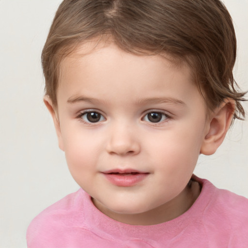 Joyful white child male with short  brown hair and brown eyes