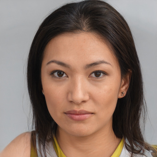 Neutral asian young-adult female with medium  brown hair and brown eyes