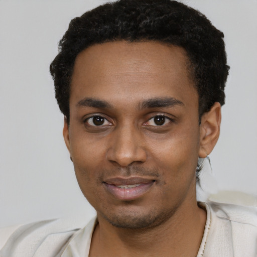 Neutral black young-adult male with short  black hair and brown eyes