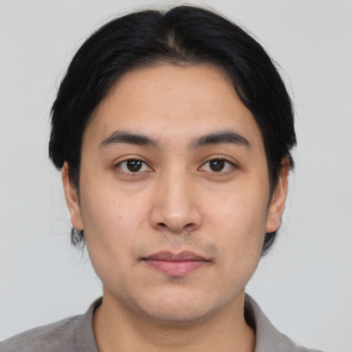 Neutral asian young-adult male with short  black hair and brown eyes