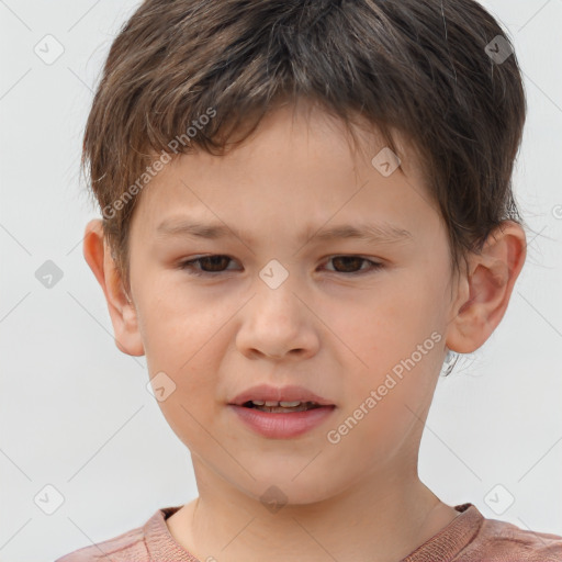 Joyful white child male with short  brown hair and brown eyes