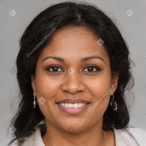 Joyful black young-adult female with medium  brown hair and brown eyes