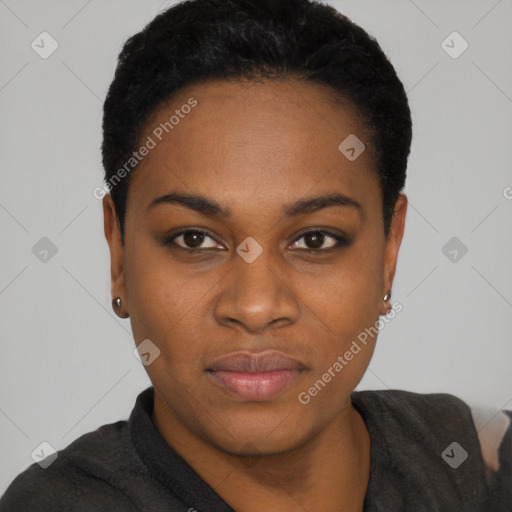 Joyful black young-adult female with short  black hair and brown eyes