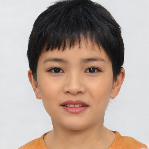Joyful asian child female with short  black hair and brown eyes