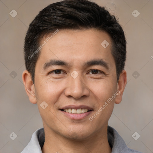 Joyful white young-adult male with short  black hair and brown eyes