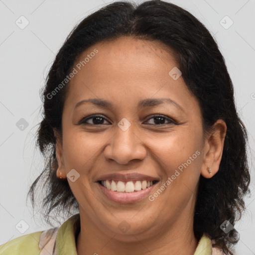 Joyful white adult female with medium  brown hair and brown eyes