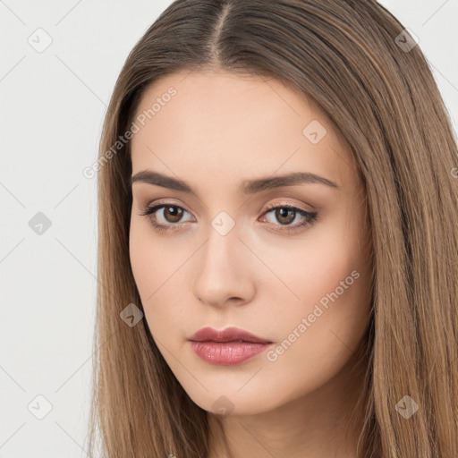 Neutral white young-adult female with long  brown hair and brown eyes