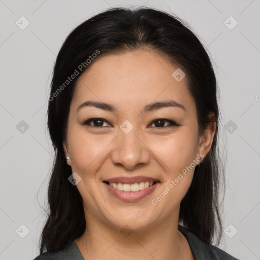 Joyful asian young-adult female with long  brown hair and brown eyes