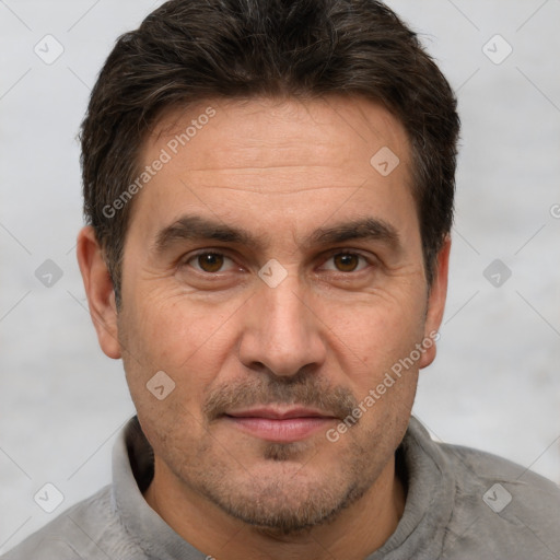 Joyful white adult male with short  brown hair and brown eyes