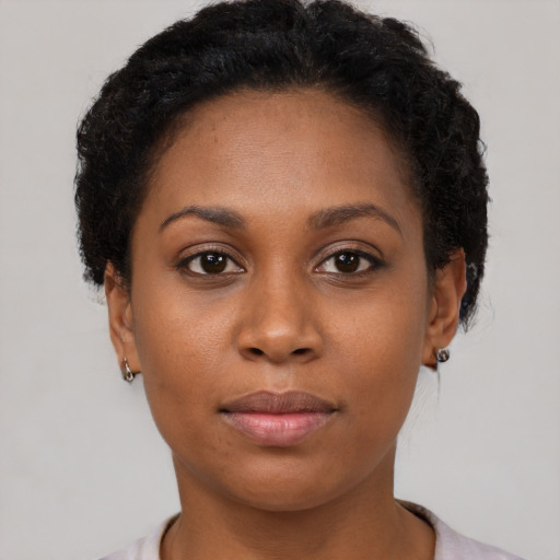 Neutral black young-adult female with short  brown hair and brown eyes
