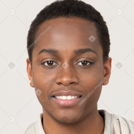 Joyful black young-adult male with short  brown hair and brown eyes