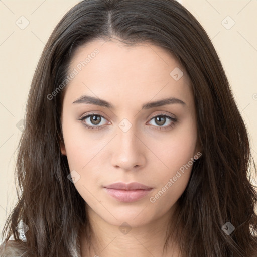 Neutral white young-adult female with long  brown hair and brown eyes