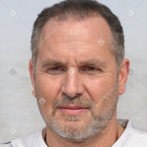 Joyful white middle-aged male with short  brown hair and brown eyes