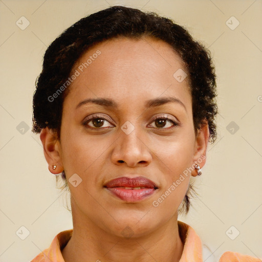 Joyful latino young-adult female with short  brown hair and brown eyes