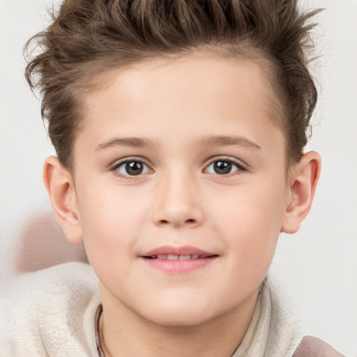 Joyful white child female with short  brown hair and brown eyes