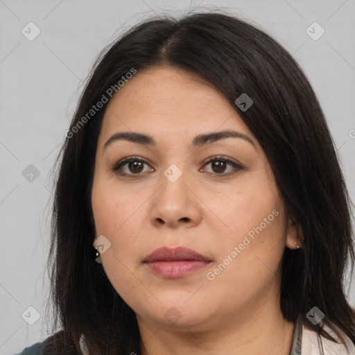 Joyful latino young-adult female with long  brown hair and brown eyes