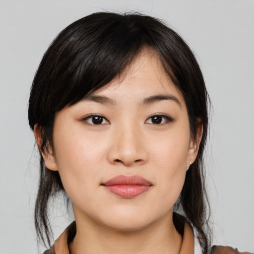 Neutral asian young-adult female with medium  black hair and brown eyes