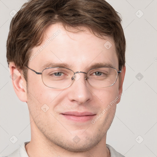 Joyful white adult male with short  brown hair and grey eyes