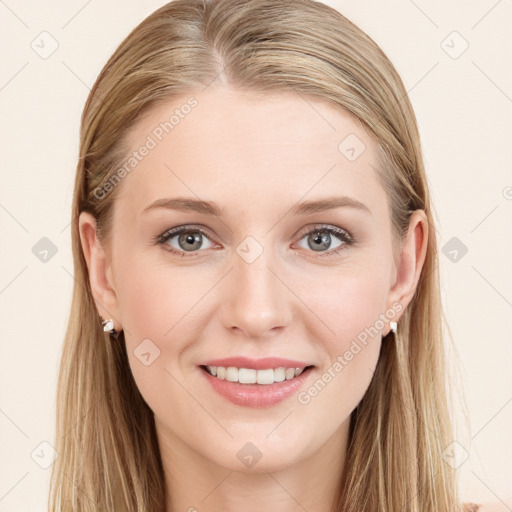 Joyful white young-adult female with long  brown hair and blue eyes