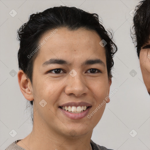 Joyful asian young-adult male with short  brown hair and brown eyes