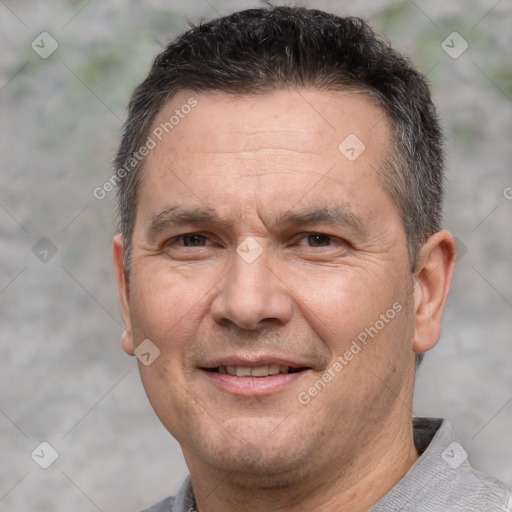 Joyful white adult male with short  brown hair and brown eyes