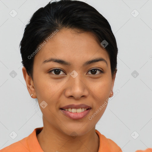 Joyful latino young-adult female with short  brown hair and brown eyes