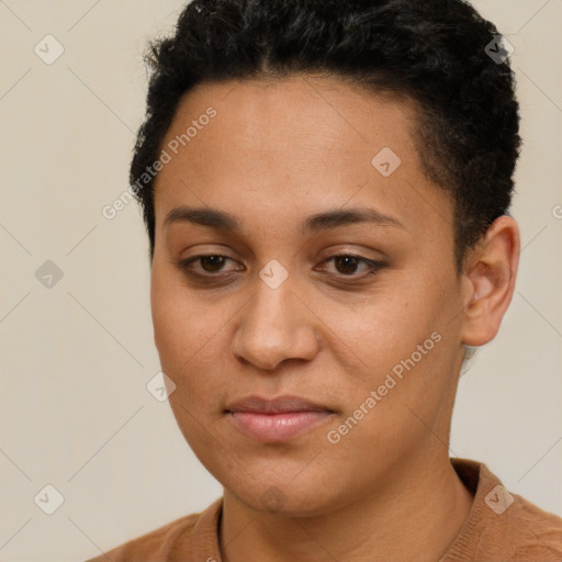 Joyful latino young-adult female with short  brown hair and brown eyes