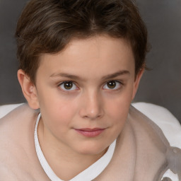 Joyful white child female with short  brown hair and brown eyes