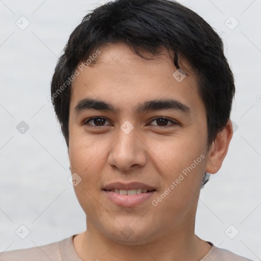 Joyful latino young-adult male with short  brown hair and brown eyes