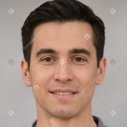 Joyful white young-adult male with short  brown hair and brown eyes