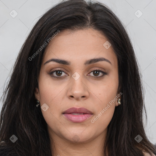 Joyful latino young-adult female with long  brown hair and brown eyes