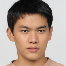 Neutral asian young-adult male with short  brown hair and brown eyes