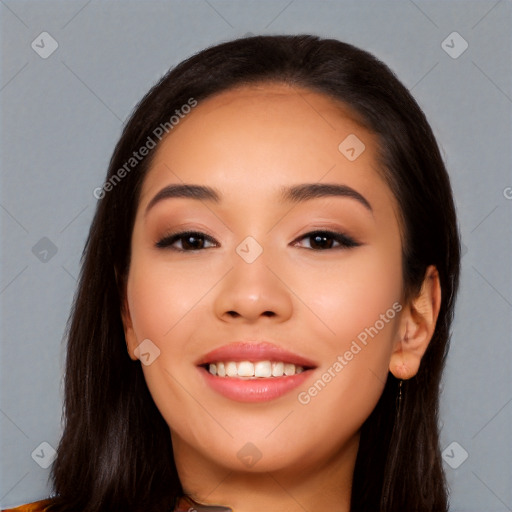 Joyful latino young-adult female with long  brown hair and brown eyes