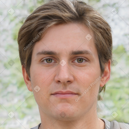 Joyful white adult male with short  brown hair and grey eyes