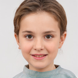 Joyful white child female with medium  brown hair and brown eyes