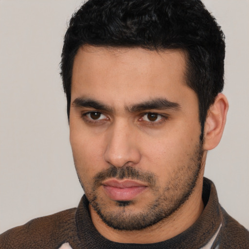 Neutral white young-adult male with short  black hair and brown eyes