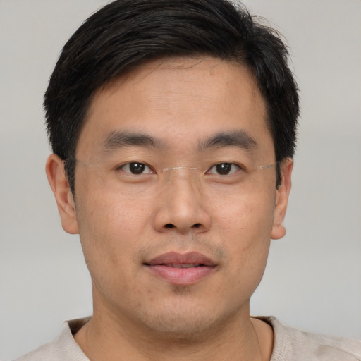 Neutral asian young-adult male with short  brown hair and brown eyes