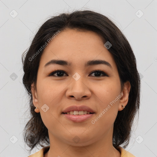 Joyful asian young-adult female with medium  brown hair and brown eyes