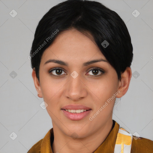 Joyful latino young-adult female with short  black hair and brown eyes