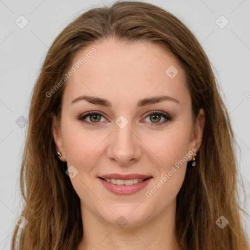 Joyful white young-adult female with long  brown hair and green eyes