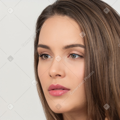 Neutral white young-adult female with long  brown hair and brown eyes